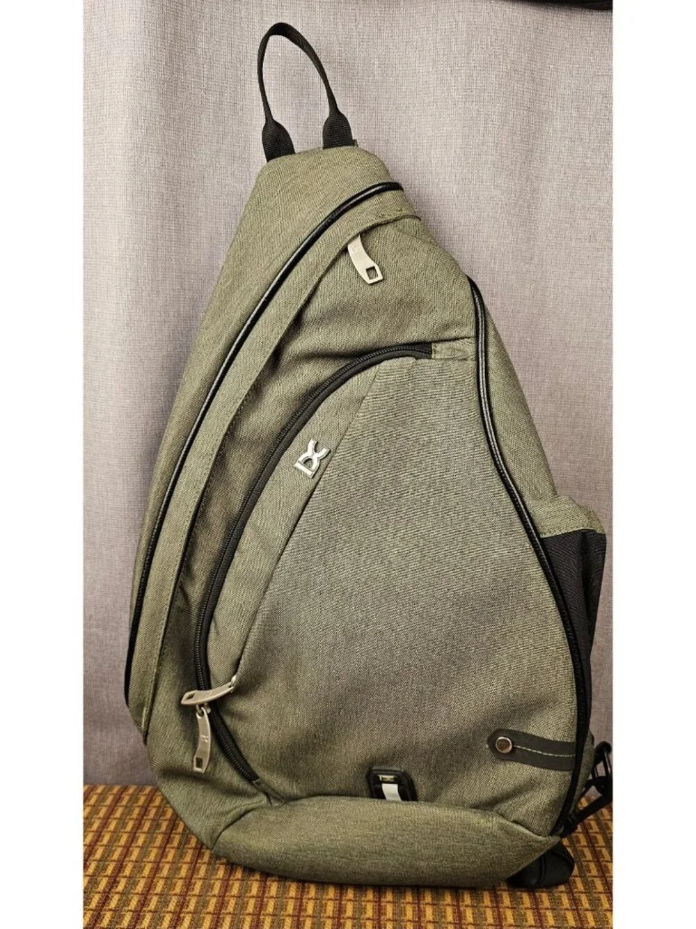 DC Sling Backpack Olive Black Adjustable Strap Multiple Compartments Durable Lig